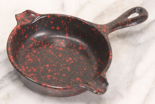 Lot 080 - Vintage Cast Iron Enameled Ashtray With Red Spatter Decoration By Wagner, 6-1/4" L