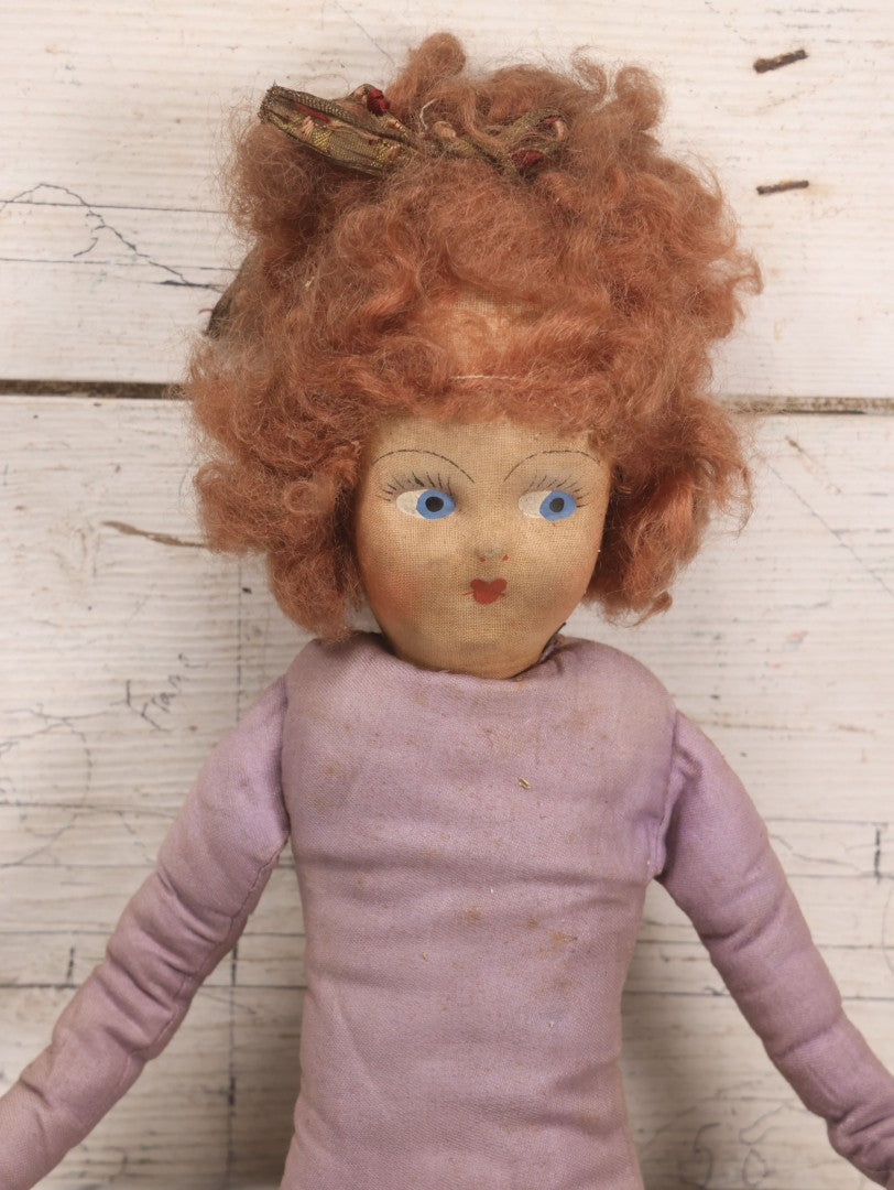 Lot 082 - Antique Boudoir Doll With Painted Features, Mohair Wig, And Floppy Lavender-Pink Body, 27" L