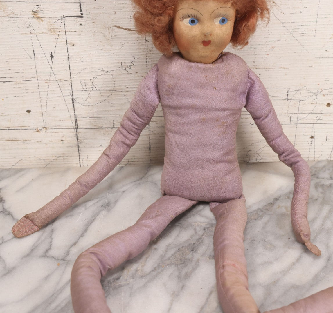 Lot 082 - Antique Boudoir Doll With Painted Features, Mohair Wig, And Floppy Lavender-Pink Body, 27" L