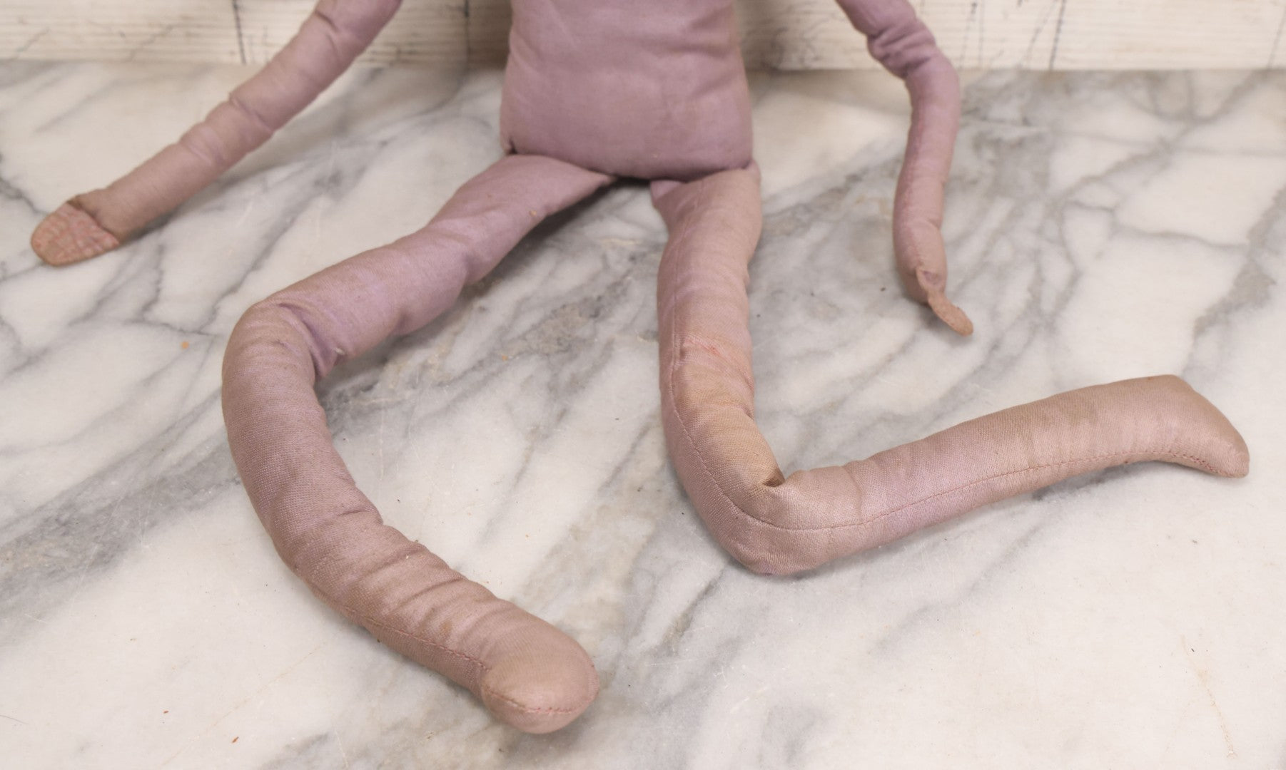 Lot 082 - Antique Boudoir Doll With Painted Features, Mohair Wig, And Floppy Lavender-Pink Body, 27" L