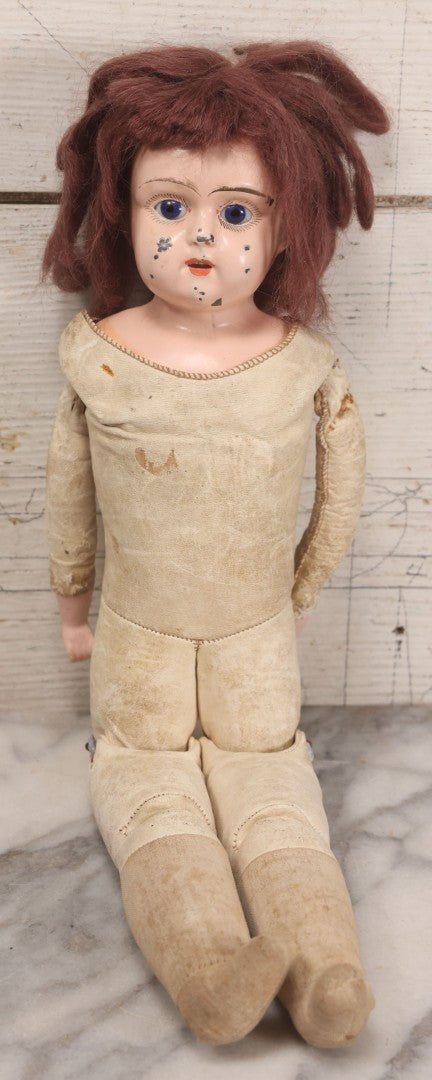 Lot 083 - Antique German Metal Head Doll With Blue Glass Eyes, Leather And Cloth Body And Limbs, Circa 1880s-1910s 17" H