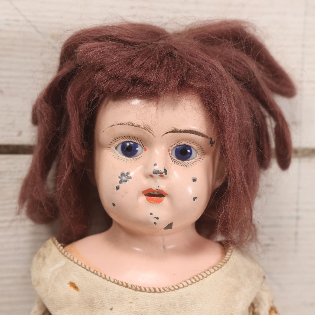 Lot 083 - Antique German Metal Head Doll With Blue Glass Eyes, Leather And Cloth Body And Limbs, Circa 1880s-1910s 17" H