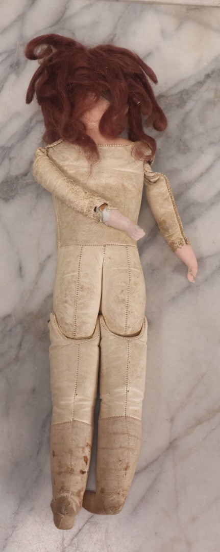 Lot 083 - Antique German Metal Head Doll With Blue Glass Eyes, Leather And Cloth Body And Limbs, Circa 1880s-1910s 17" H