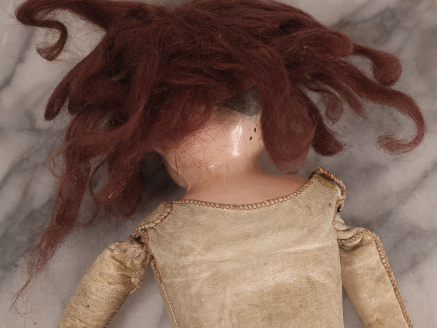 Lot 083 - Antique German Metal Head Doll With Blue Glass Eyes, Leather And Cloth Body And Limbs, Circa 1880s-1910s 17" H