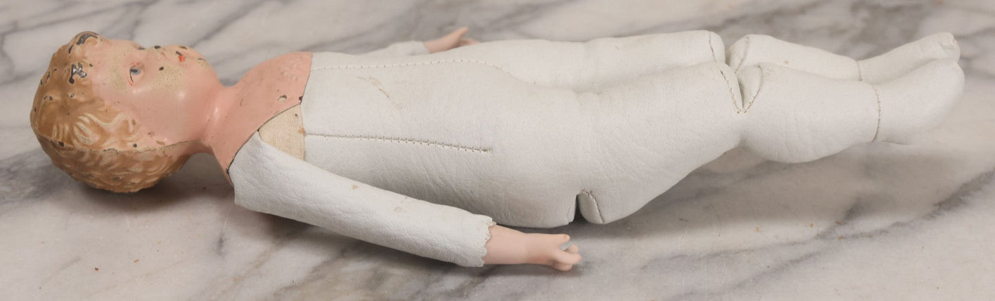 Lot 084 - Antique German Minerva Metal Head Doll With Molded Blonde Hair And Painted Features, Cloth And Leather Body, Circa 1900s-1920s 12" H