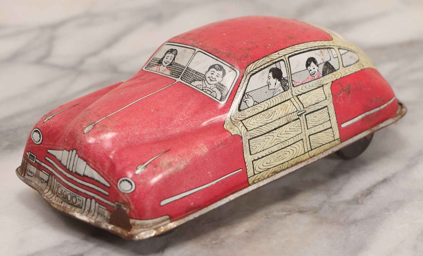 Lot 090 - Vintage Courtland Woody Wagon Tin Lithograph Friction Toy Car, Circa 1950, Courtland Toys, Camden, New Jersey, Note Not Working, 7-1/4" L