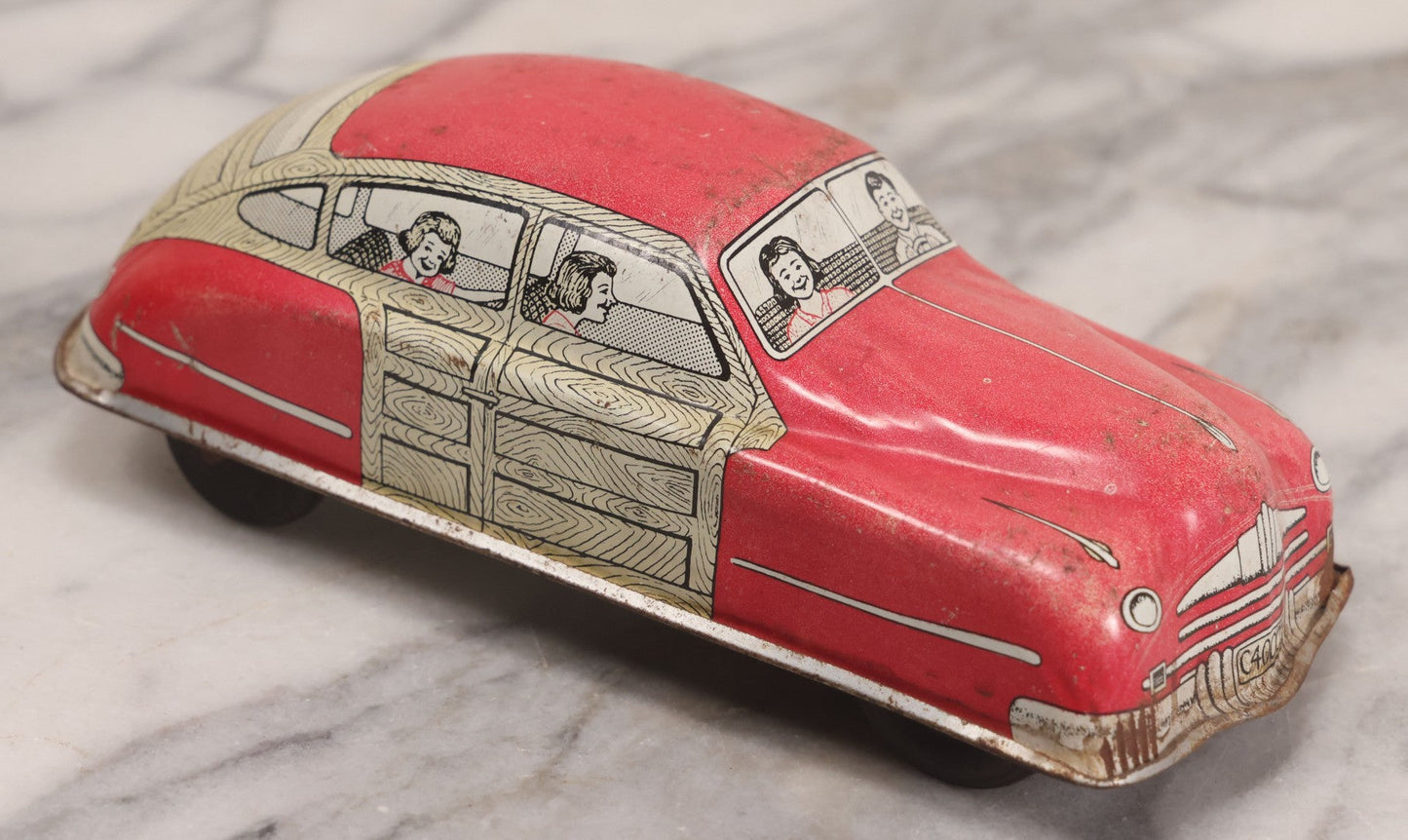 Lot 090 - Vintage Courtland Woody Wagon Tin Lithograph Friction Toy Car, Circa 1950, Courtland Toys, Camden, New Jersey, Note Not Working, 7-1/4" L