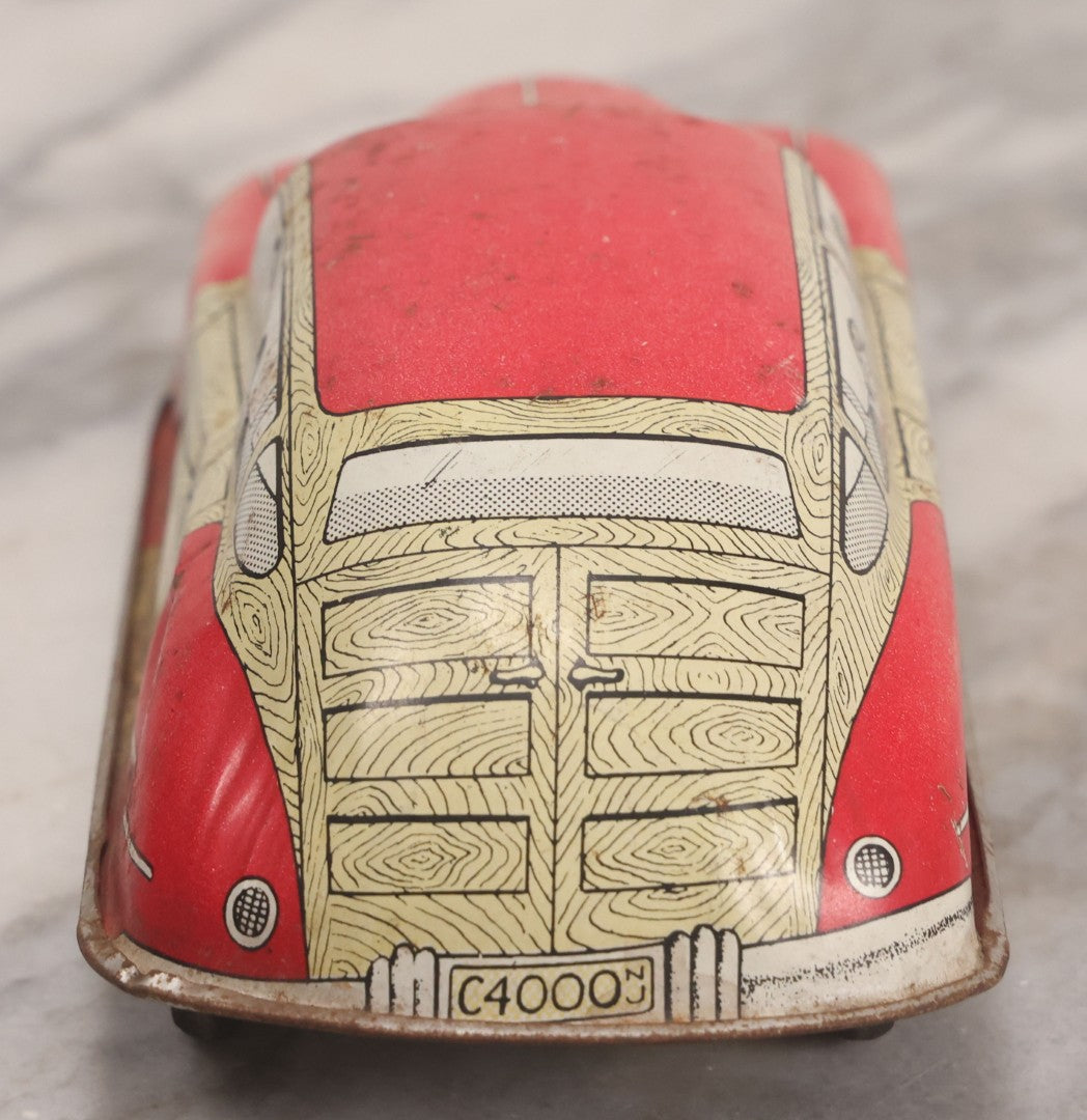 Lot 090 - Vintage Courtland Woody Wagon Tin Lithograph Friction Toy Car, Circa 1950, Courtland Toys, Camden, New Jersey, Note Not Working, 7-1/4" L