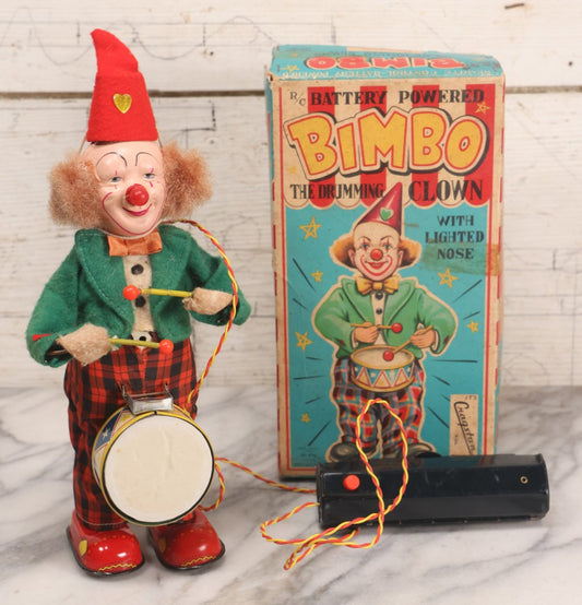 Lot 091 - Vintage Bimbo The Drumming Clown Battery Powered Remote Control Toy With Lighted Nose By Cragstan Corporation, No. 712, Alps, Japan, Patent No. 7096, In Original Box, Note Not Working, 9-1/2" H