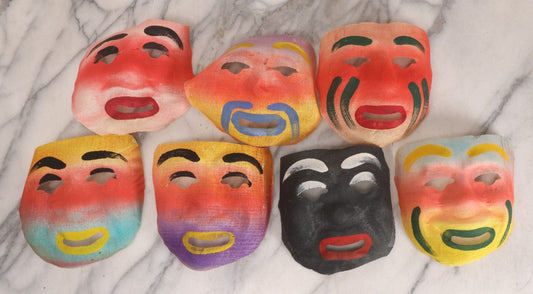 Lot 094 - Grouping Of Seven Vintage N.O.S. Colorful Gauze Clown Halloween Masks By Des Arts Products, No. 764, "Masks, The Universal Toy"