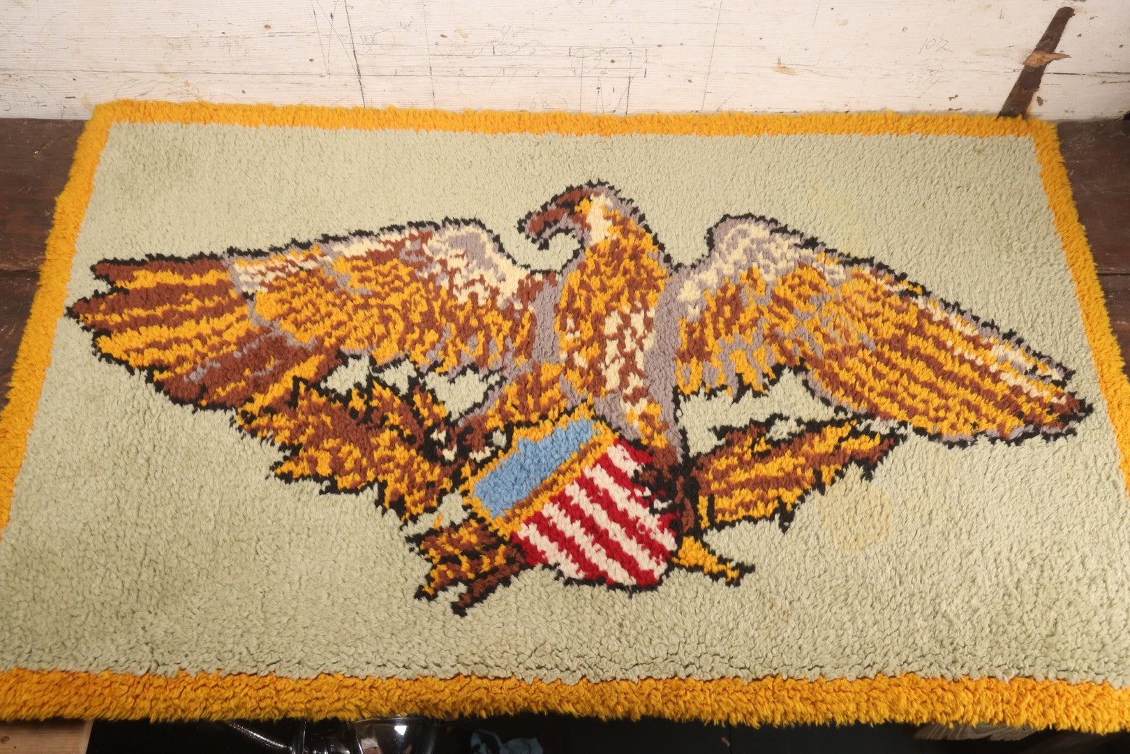 Lot 101 - Vintage Handmade Shag Rug Depicting Patriotic Eagle With American Shield, Made By Rosella Considine, Minor Staining And Wear, 49" x 30"