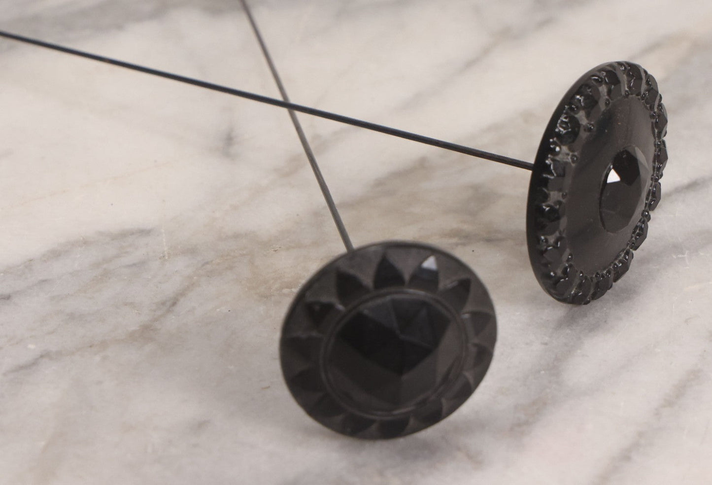 Lot 104 - Pair Of Antique Black Hat Pins With Decorative Tops, 10-1/2" L And 12-1/2" L