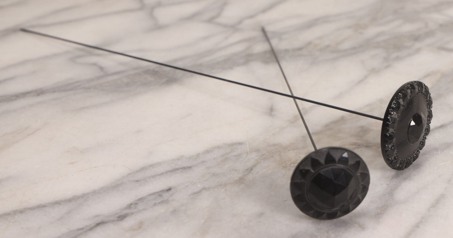 Lot 104 - Pair Of Antique Black Hat Pins With Decorative Tops, 10-1/2" L And 12-1/2" L