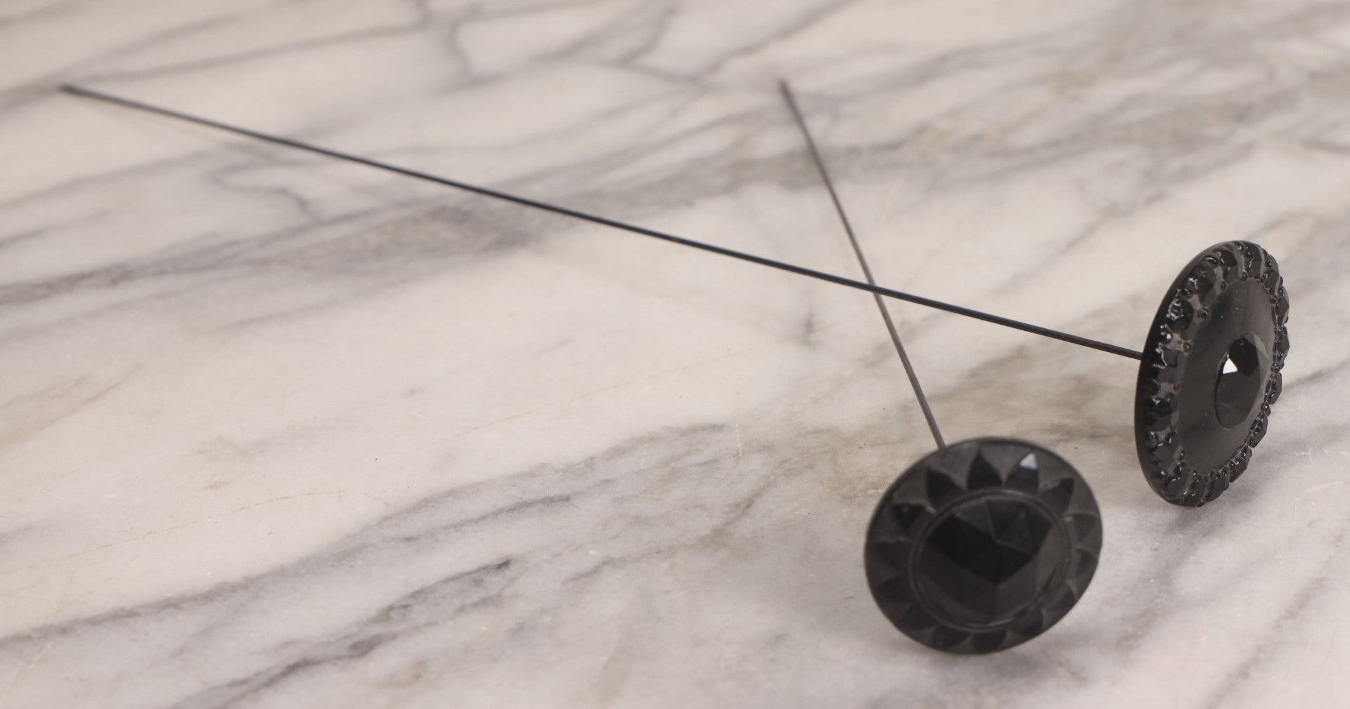 Lot 104 - Pair Of Antique Black Hat Pins With Decorative Tops, 10-1/2" L And 12-1/2" L