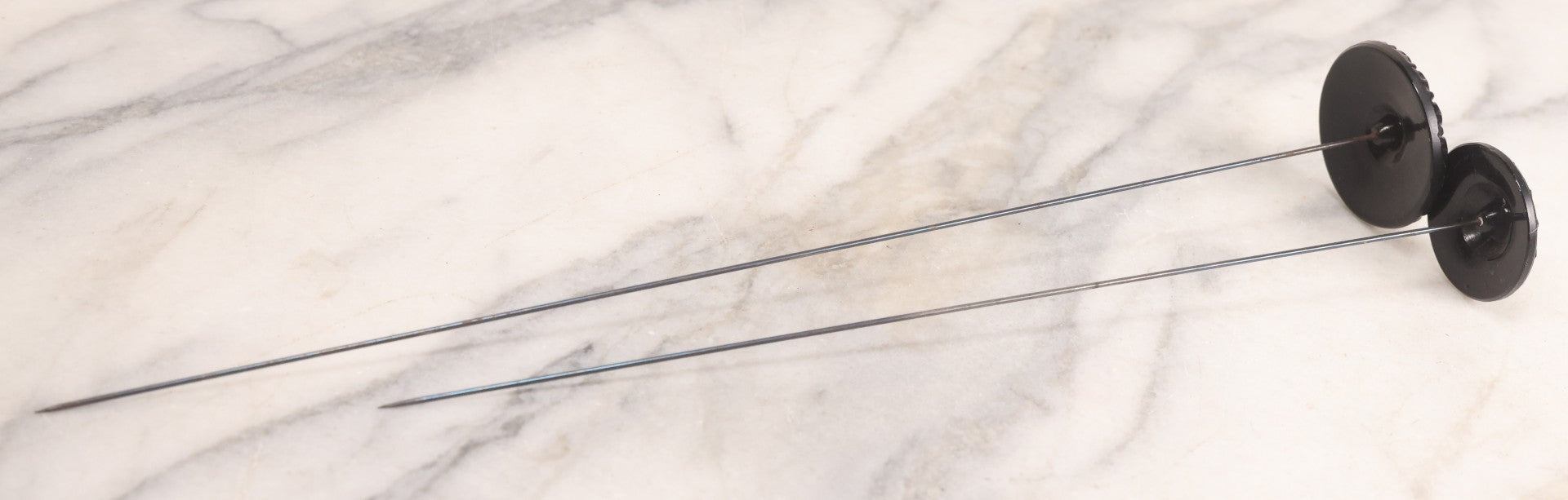 Lot 104 - Pair Of Antique Black Hat Pins With Decorative Tops, 10-1/2" L And 12-1/2" L