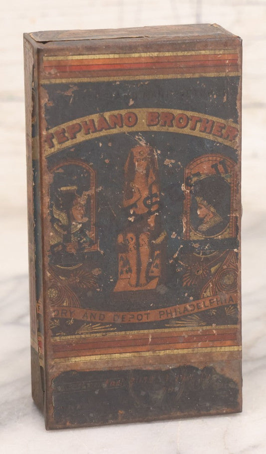 Lot 106 - Antique Stephano Brothers Paper Covered Egyptian Cigarette Tin For Ramses II Cigarettes, Manufactured From Yenidj Turkish Tobacco, Philadelphia, Pennsylvania