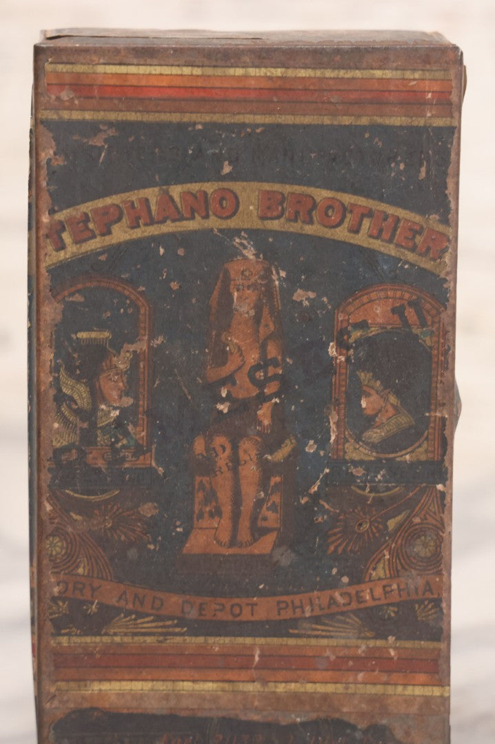 Lot 106 - Antique Stephano Brothers Paper Covered Egyptian Cigarette Tin For Ramses II Cigarettes, Manufactured From Yenidj Turkish Tobacco, Philadelphia, Pennsylvania