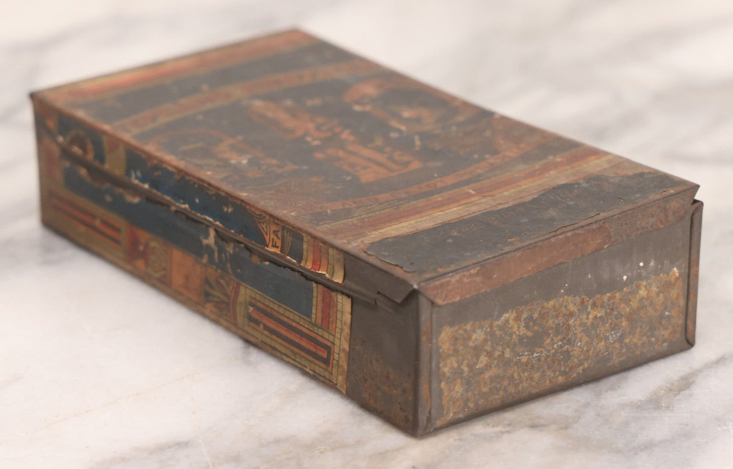 Lot 106 - Antique Stephano Brothers Paper Covered Egyptian Cigarette Tin For Ramses II Cigarettes, Manufactured From Yenidj Turkish Tobacco, Philadelphia, Pennsylvania