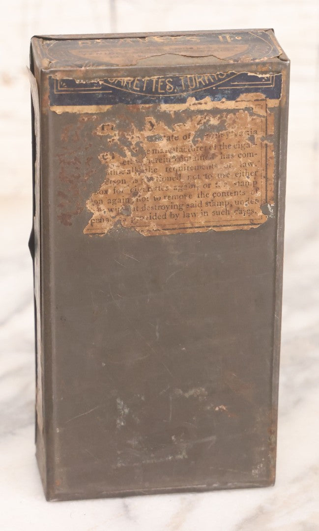 Lot 106 - Antique Stephano Brothers Paper Covered Egyptian Cigarette Tin For Ramses II Cigarettes, Manufactured From Yenidj Turkish Tobacco, Philadelphia, Pennsylvania
