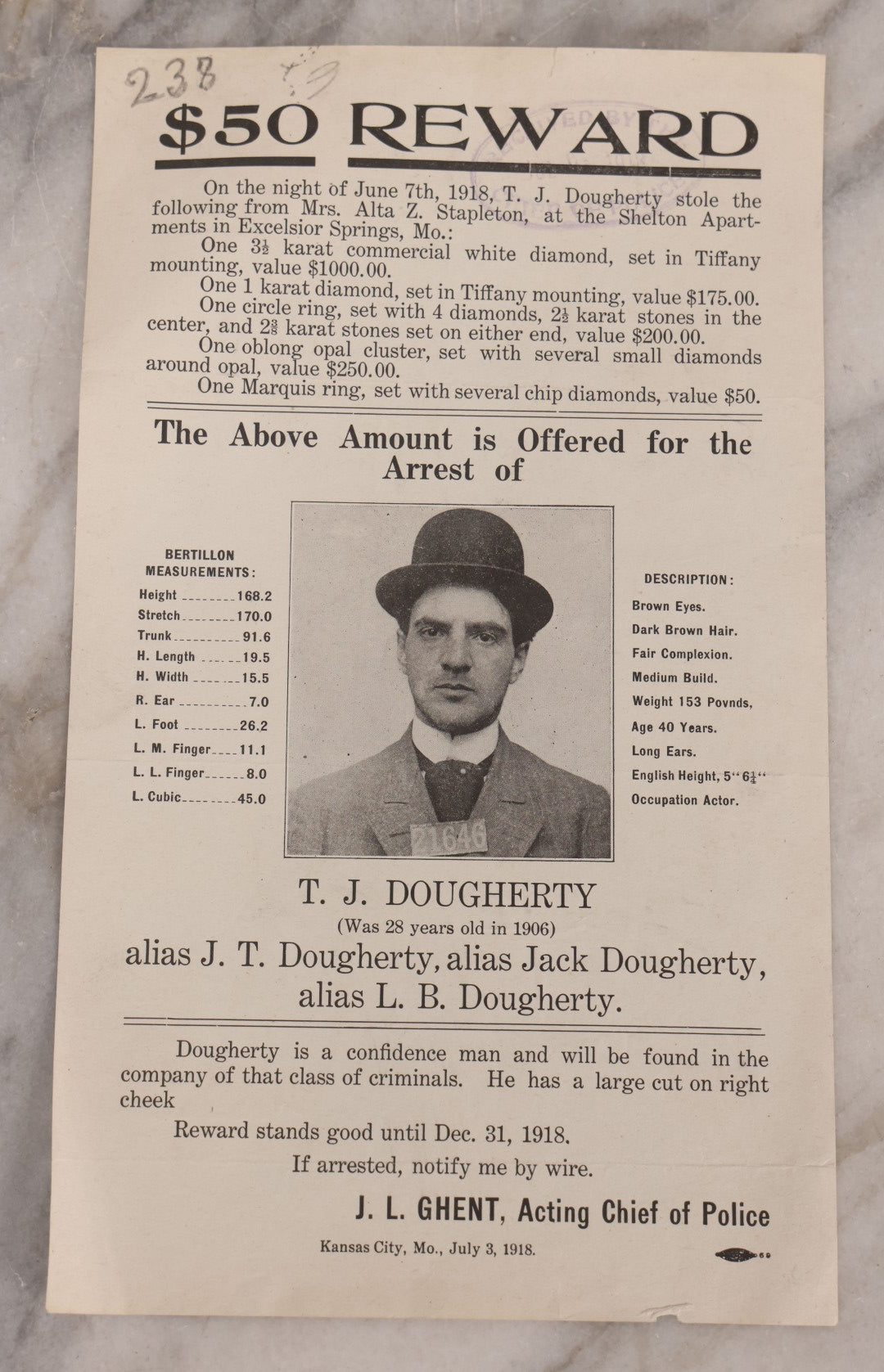 Lot 131 - Antique Wanted Poster With Photograph For T.J. Dougherty Alias J.T. Dougherty, Jack Dougherty, & L.B. Dougherty, $50 Reward, For Theft, Kansas City, Missouri, July 3, 1918
