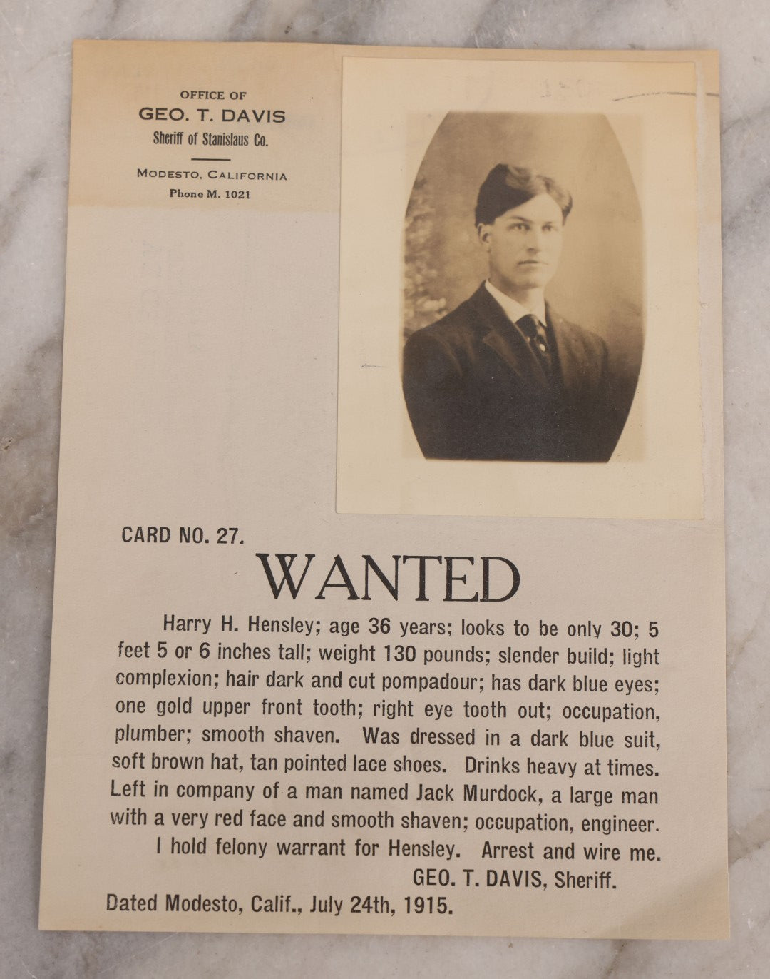 Lot 132 - Antique Wanted Poster With Photograph For Harry H. Hensley, Felony Warrant, Office Of Geo. T. Davis, Sheriff Of Stanislaus County, Modesto, California, July 24, 1915