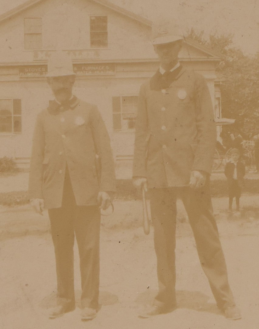 Lot 136 - Antique Board-Mounted Photograph Of Two Police Officers, One Holding Billy Club, Circa 1890