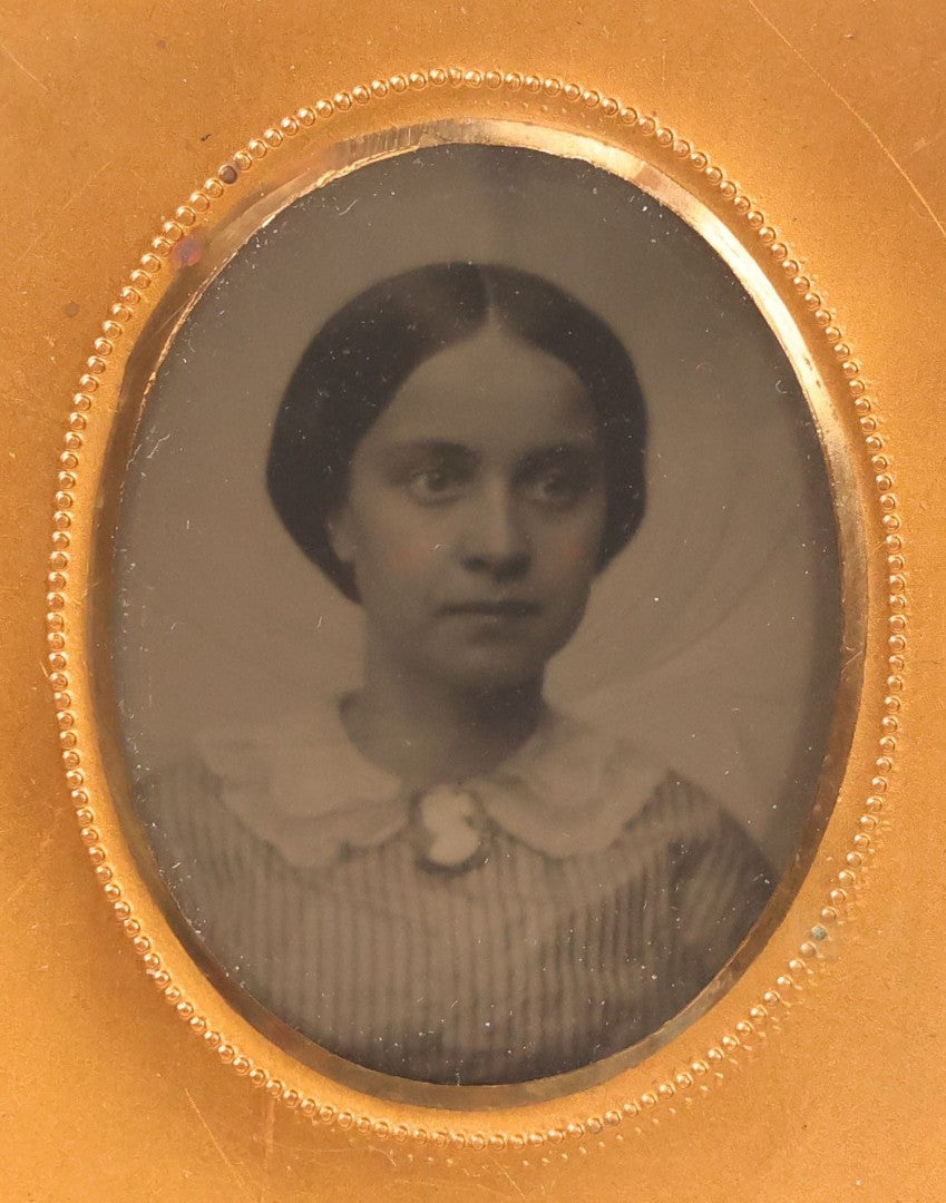 Lot 139 - Antique 1/9th Plate Ambrotype Photograph Of Young Woman In Thermoplastic Union Case, Photographed By Wyman & Co., Boston, Littlefield, Parsons & Co. Case Patented 1857, With Advertising Card