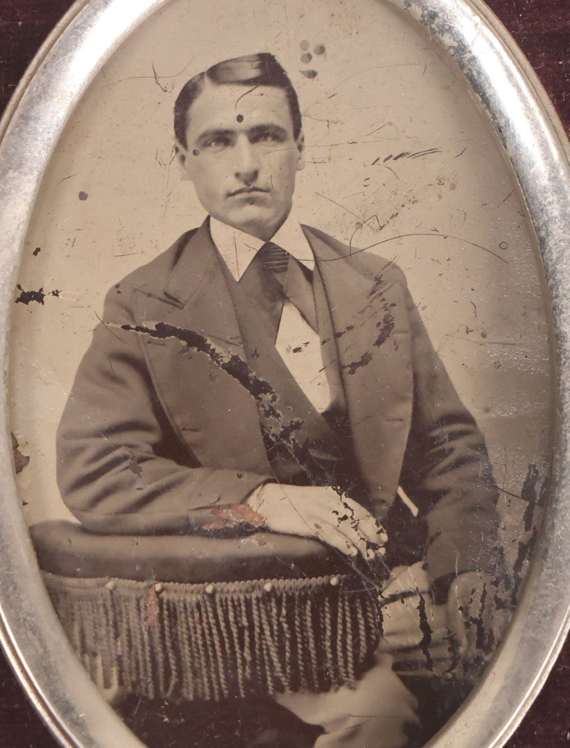 Lot 140 - Antique Tintype Photograph Of Young Man In Velvet And Metal Frame, 3-1/4" x 4-1/2"