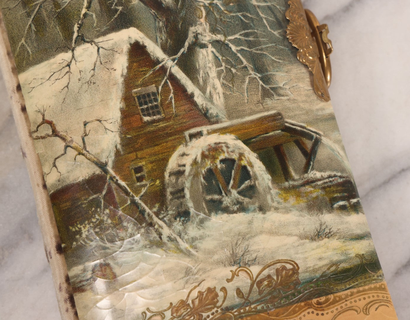Lot 145 - Antique Celluloid Photograph Album With Winter Mill Scene And Art Nouveau Cameo, Mostly Empty, Circa 1890s-1900s
