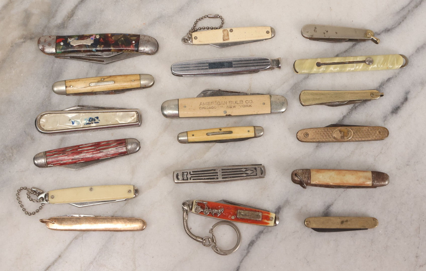 Lot 154 - Grouping Of 18 Vintage Pocket Knives Including American Bulb Co. Advertising Knife