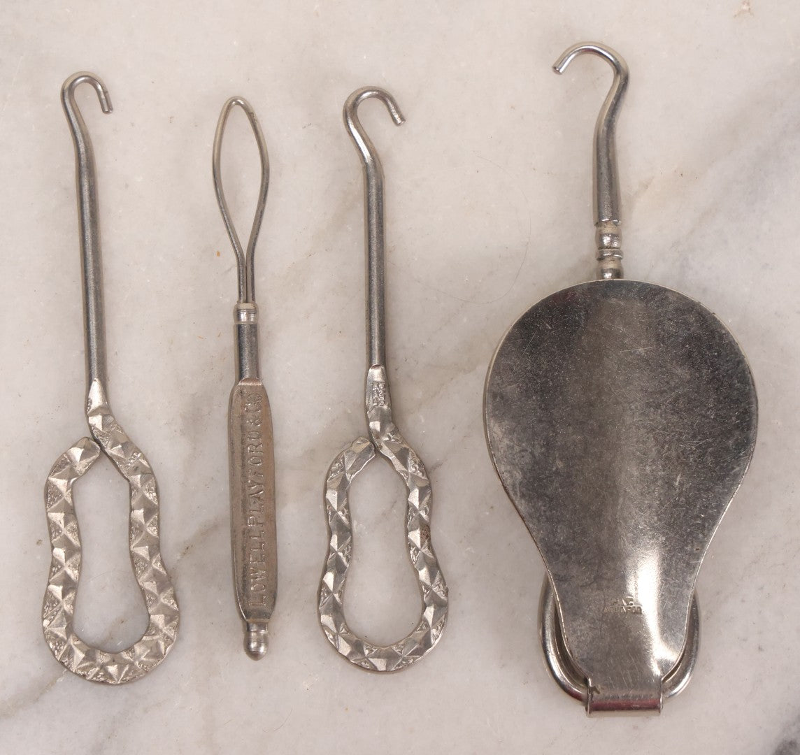 Lot 158 - Grouping Of 16 Antique And Vintage Buttonhooks In Various Materials Including Sterling Silver, Bone, Celluloid, And Mother-Of-Pearl
