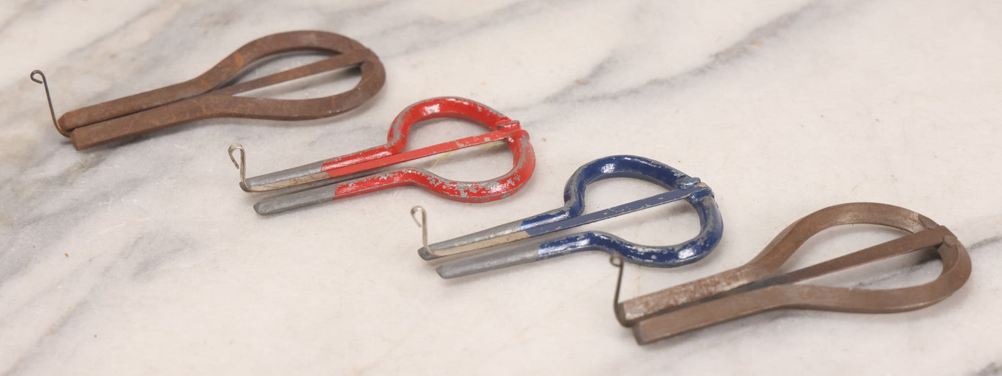 Lot 159 - Grouping Of Four Antique And Vintage Jaw Harps, Mouth Harps, Jew's Harps In Steel With Painted Enamel Finishes