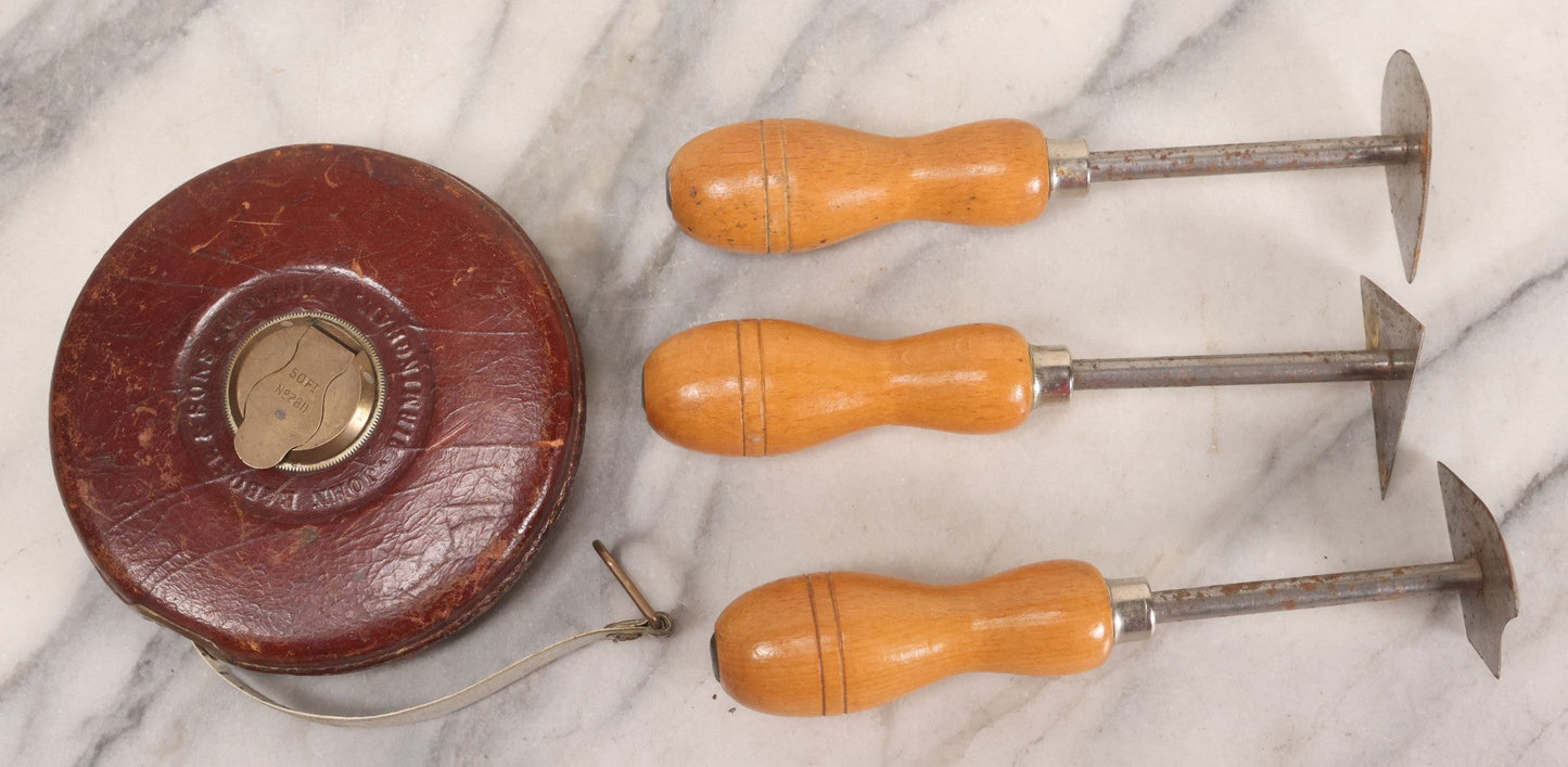 Lot 165 - Grouping Of Four Antique And Vintage Tools Including John Rabone & Sons 50 Ft Tape Measure, 5-1/4" Diameter, And Three Pottery Tools, 7-1/2" L Each