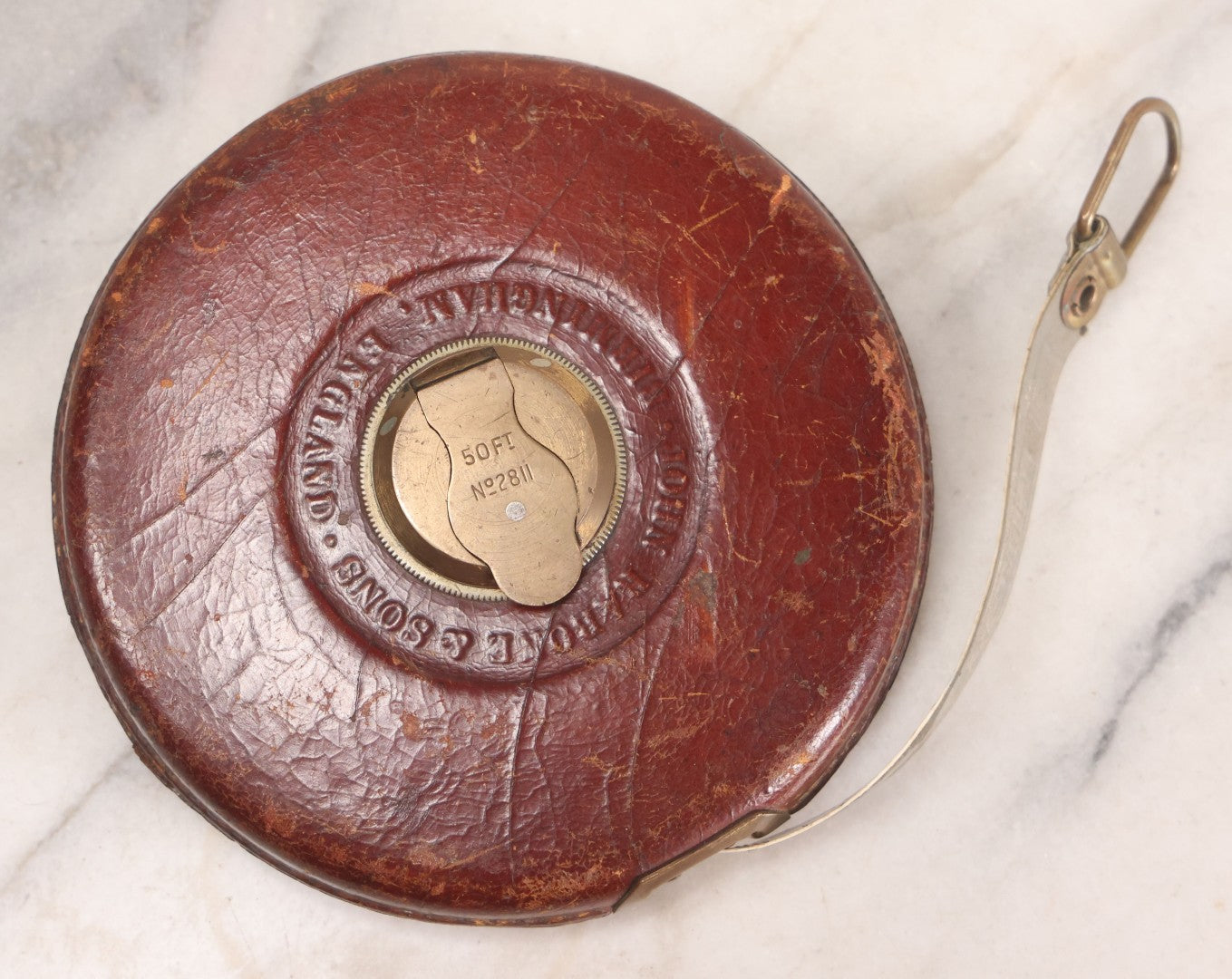 Lot 165 - Grouping Of Four Antique And Vintage Tools Including John Rabone & Sons 50 Ft Tape Measure, 5-1/4" Diameter, And Three Pottery Tools, 7-1/2" L Each