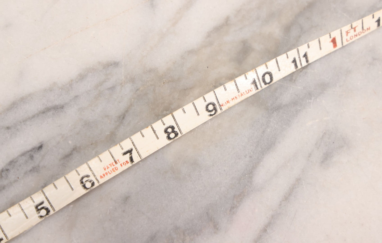 Lot 165 - Grouping Of Four Antique And Vintage Tools Including John Rabone & Sons 50 Ft Tape Measure, 5-1/4" Diameter, And Three Pottery Tools, 7-1/2" L Each