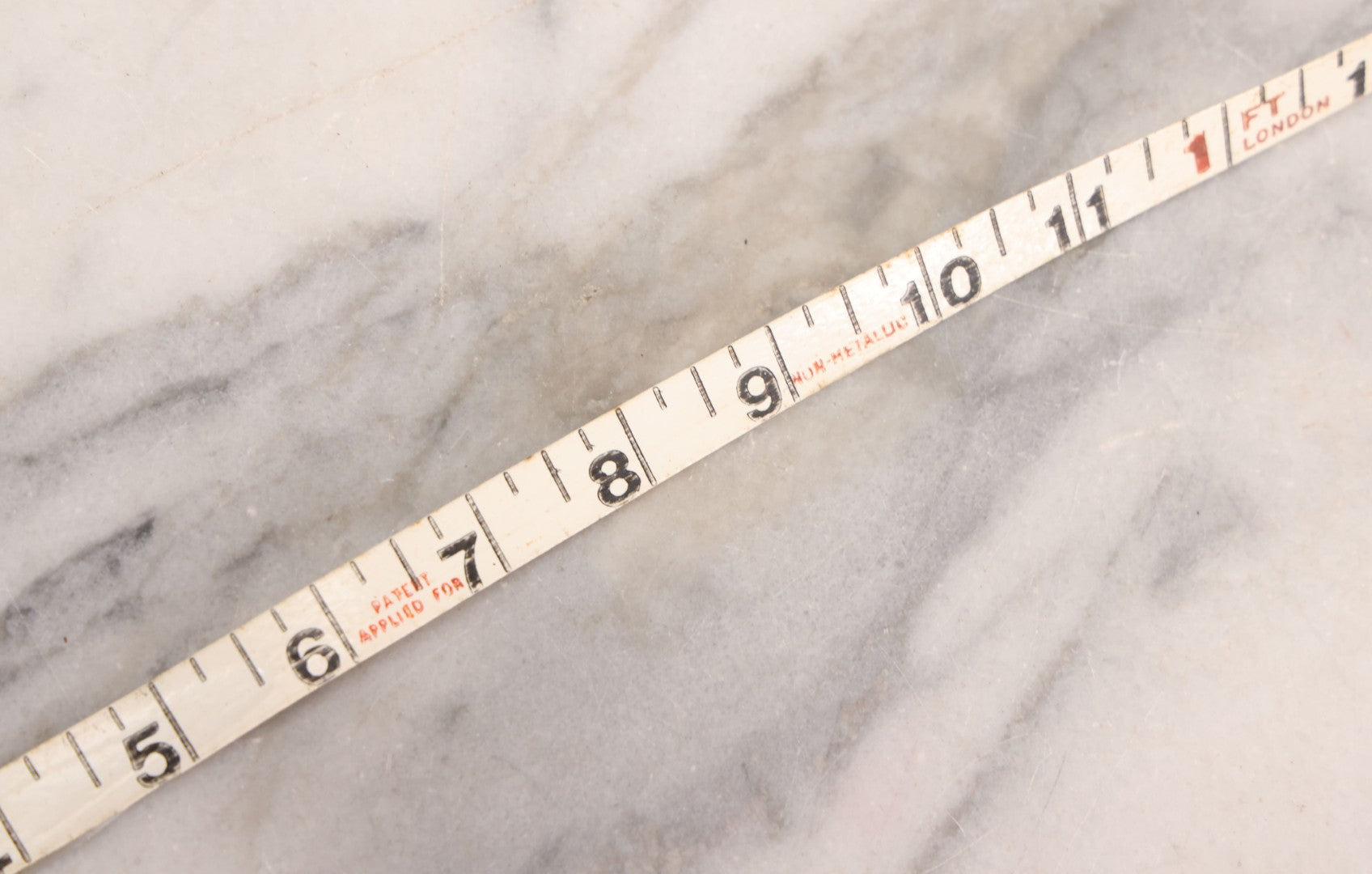 Lot 165 - Grouping Of Four Antique And Vintage Tools Including John Rabone & Sons 50 Ft Tape Measure, 5-1/4" Diameter, And Three Pottery Tools, 7-1/2" L Each