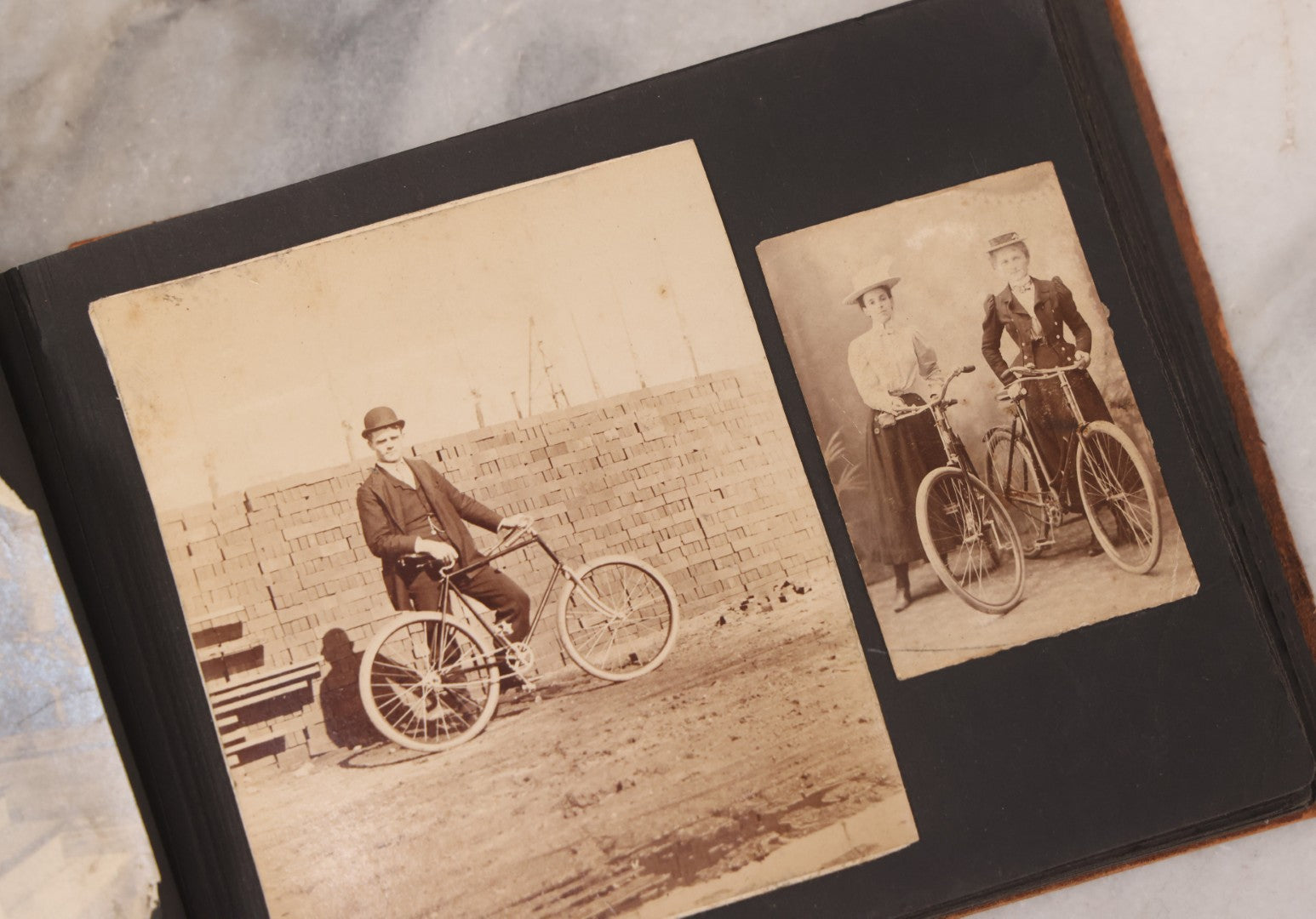 Lot 168 - Antique Snapshot Photograph Album, Leather Covers With Hand-Painted Pink Flower, Including Photos Of People With Bikes, Soldiers In Uniform, Babies, Children, Dolls, Pets, Circa 1900s-1910s