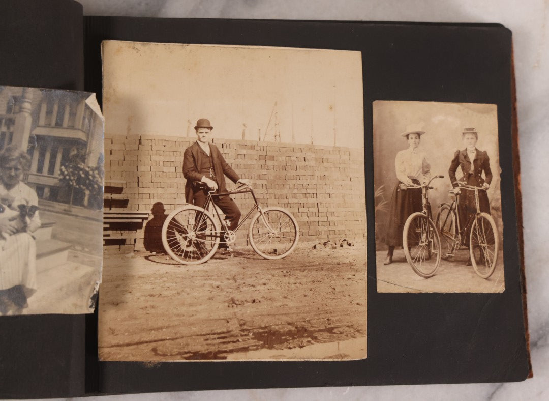 Lot 168 - Antique Snapshot Photograph Album, Leather Covers With Hand-Painted Pink Flower, Including Photos Of People With Bikes, Soldiers In Uniform, Babies, Children, Dolls, Pets, Circa 1900s-1910s