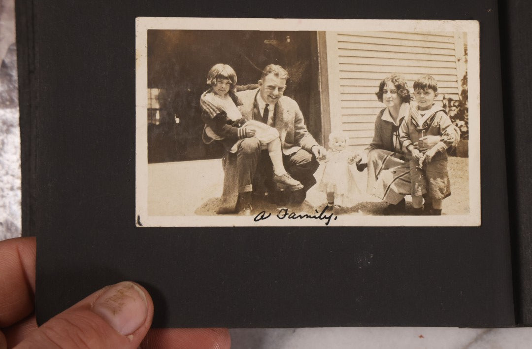 Lot 168 - Antique Snapshot Photograph Album, Leather Covers With Hand-Painted Pink Flower, Including Photos Of People With Bikes, Soldiers In Uniform, Babies, Children, Dolls, Pets, Circa 1900s-1910s