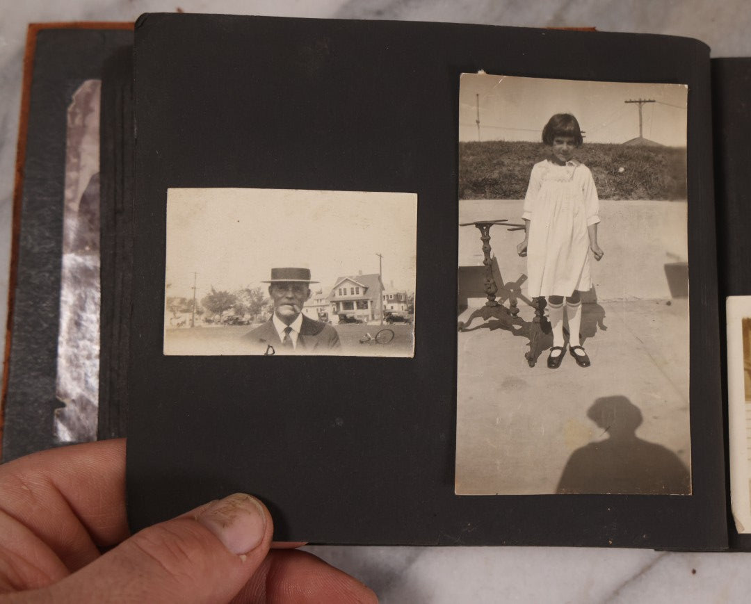 Lot 168 - Antique Snapshot Photograph Album, Leather Covers With Hand-Painted Pink Flower, Including Photos Of People With Bikes, Soldiers In Uniform, Babies, Children, Dolls, Pets, Circa 1900s-1910s