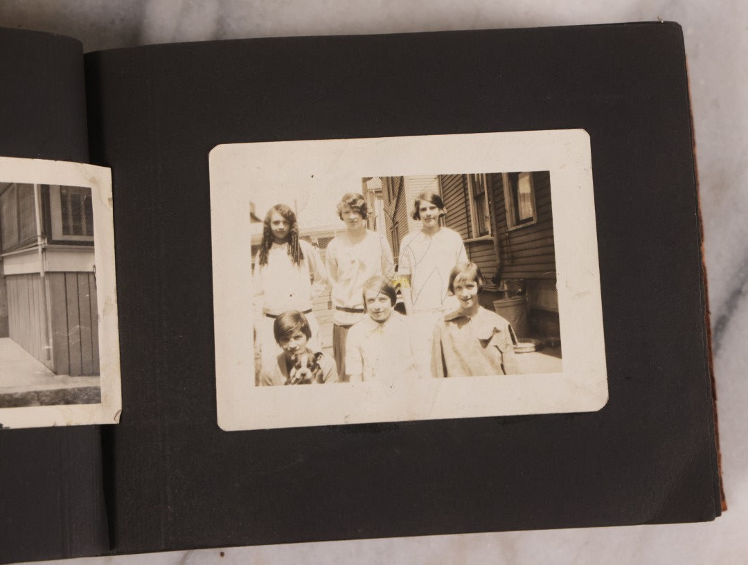 Lot 168 - Antique Snapshot Photograph Album, Leather Covers With Hand-Painted Pink Flower, Including Photos Of People With Bikes, Soldiers In Uniform, Babies, Children, Dolls, Pets, Circa 1900s-1910s