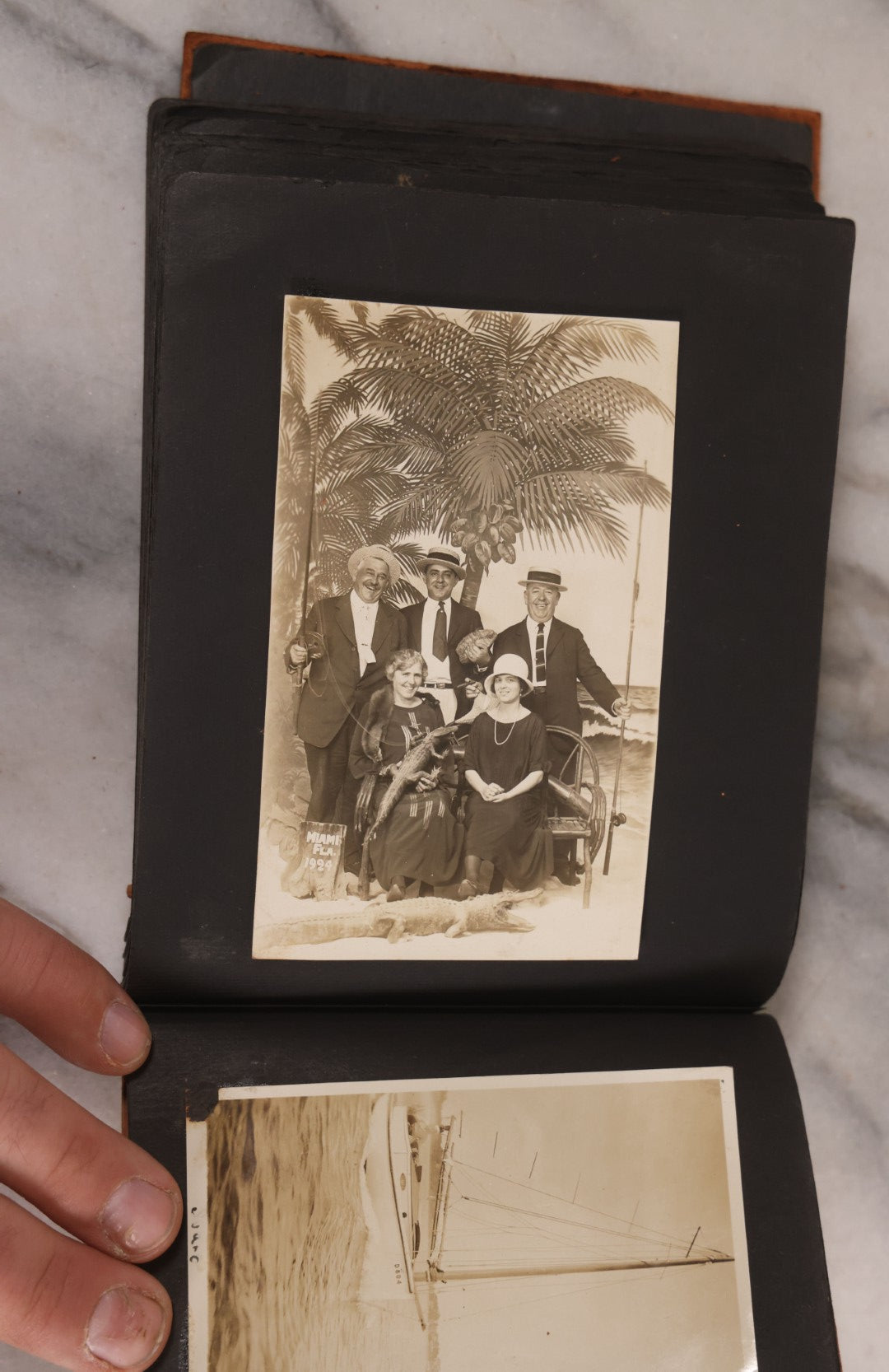 Lot 168 - Antique Snapshot Photograph Album, Leather Covers With Hand-Painted Pink Flower, Including Photos Of People With Bikes, Soldiers In Uniform, Babies, Children, Dolls, Pets, Circa 1900s-1910s