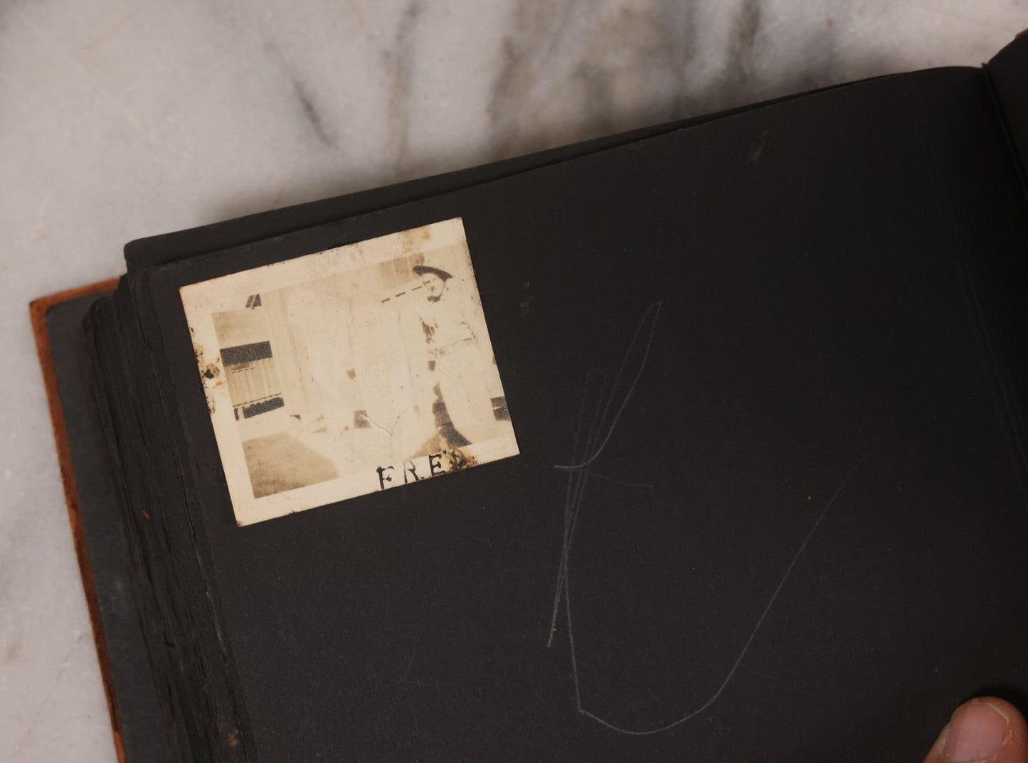 Lot 168 - Antique Snapshot Photograph Album, Leather Covers With Hand-Painted Pink Flower, Including Photos Of People With Bikes, Soldiers In Uniform, Babies, Children, Dolls, Pets, Circa 1900s-1910s