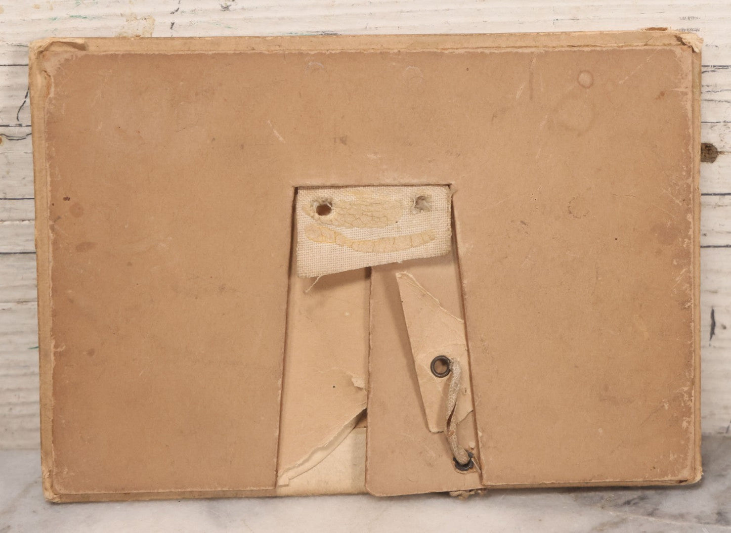 Lot 170 - Grouping Of 10 Antique Photographs In Miscellaneous Frames Including Damaged Thermoplastic Frame, Illustrated Frame With Brownies Characters, Folding Glass Mounted Photo Frame With Pastor And Church, Velvet Frame With C.D.V. Of Child, Tintypes