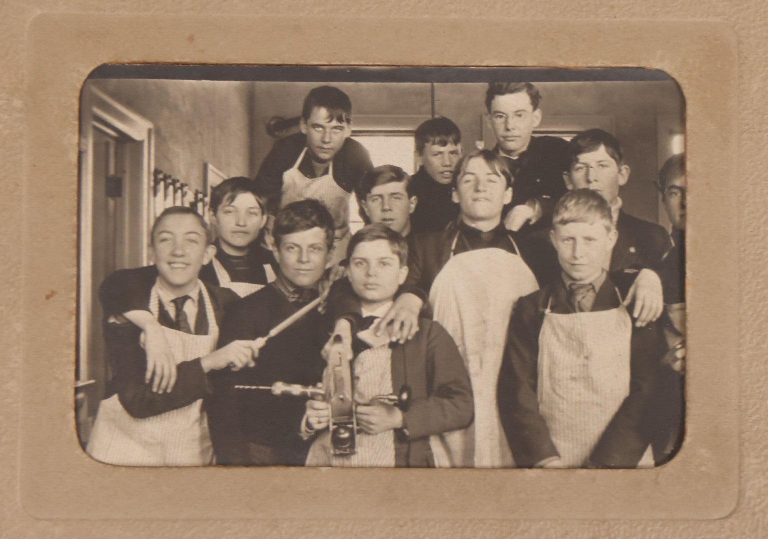 Lot 177 - Grouping Of 11 Miscellaneous Antique Board-Mounted And Unmounted Photographs Including Children In Wood Shop Class, School Class Group Portraits, Three Copies Of Occupational Photo Of Workers Outside Workplace, Child With Steam Engine Toy