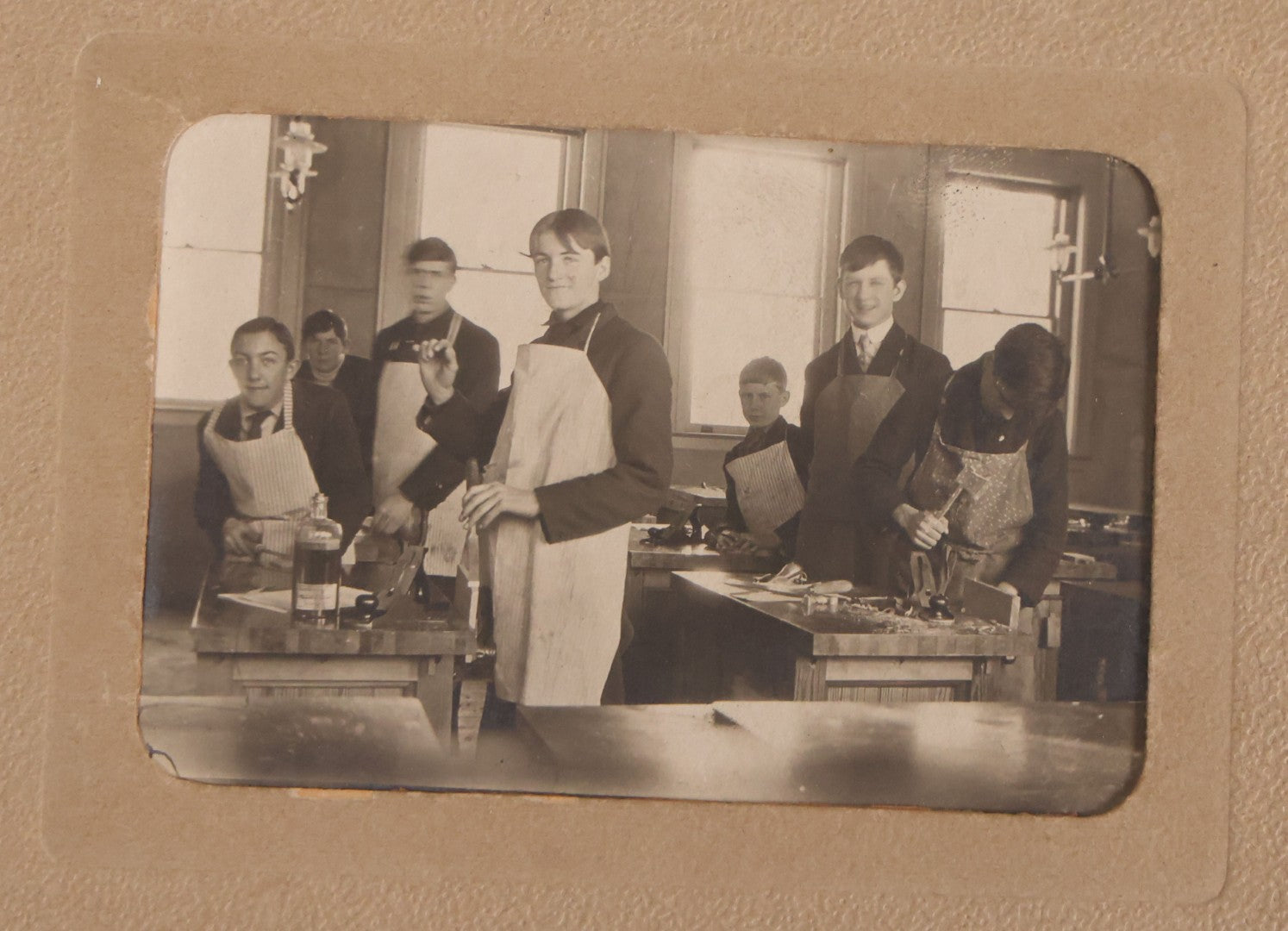 Lot 177 - Grouping Of 11 Miscellaneous Antique Board-Mounted And Unmounted Photographs Including Children In Wood Shop Class, School Class Group Portraits, Three Copies Of Occupational Photo Of Workers Outside Workplace, Child With Steam Engine Toy