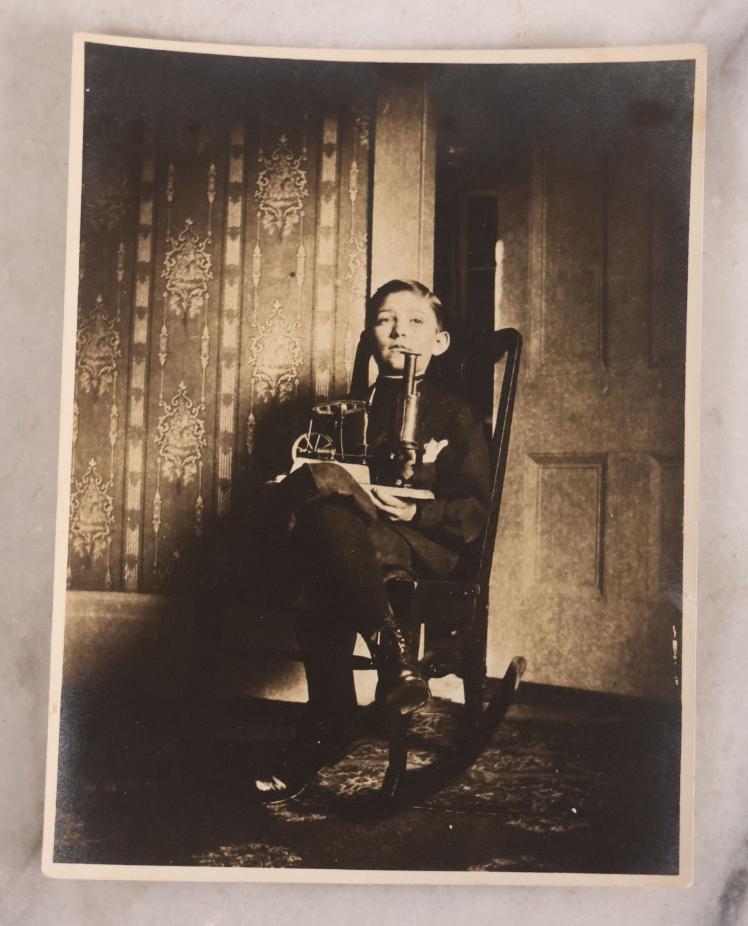 Lot 177 - Grouping Of 11 Miscellaneous Antique Board-Mounted And Unmounted Photographs Including Children In Wood Shop Class, School Class Group Portraits, Three Copies Of Occupational Photo Of Workers Outside Workplace, Child With Steam Engine Toy