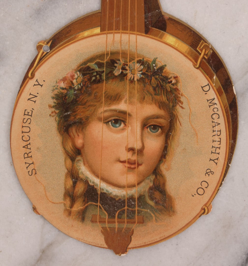 Lot 189 - Grouping Of Four Large Size Antique Chromolithograph Die Cut Advertisements Including Hood's Sarsaparilla, 1889, D. McCarthy & Co., Syracuse, New York In Banjo Form, And Two 1880s The Great Atlantic And Pacific Tea Co.