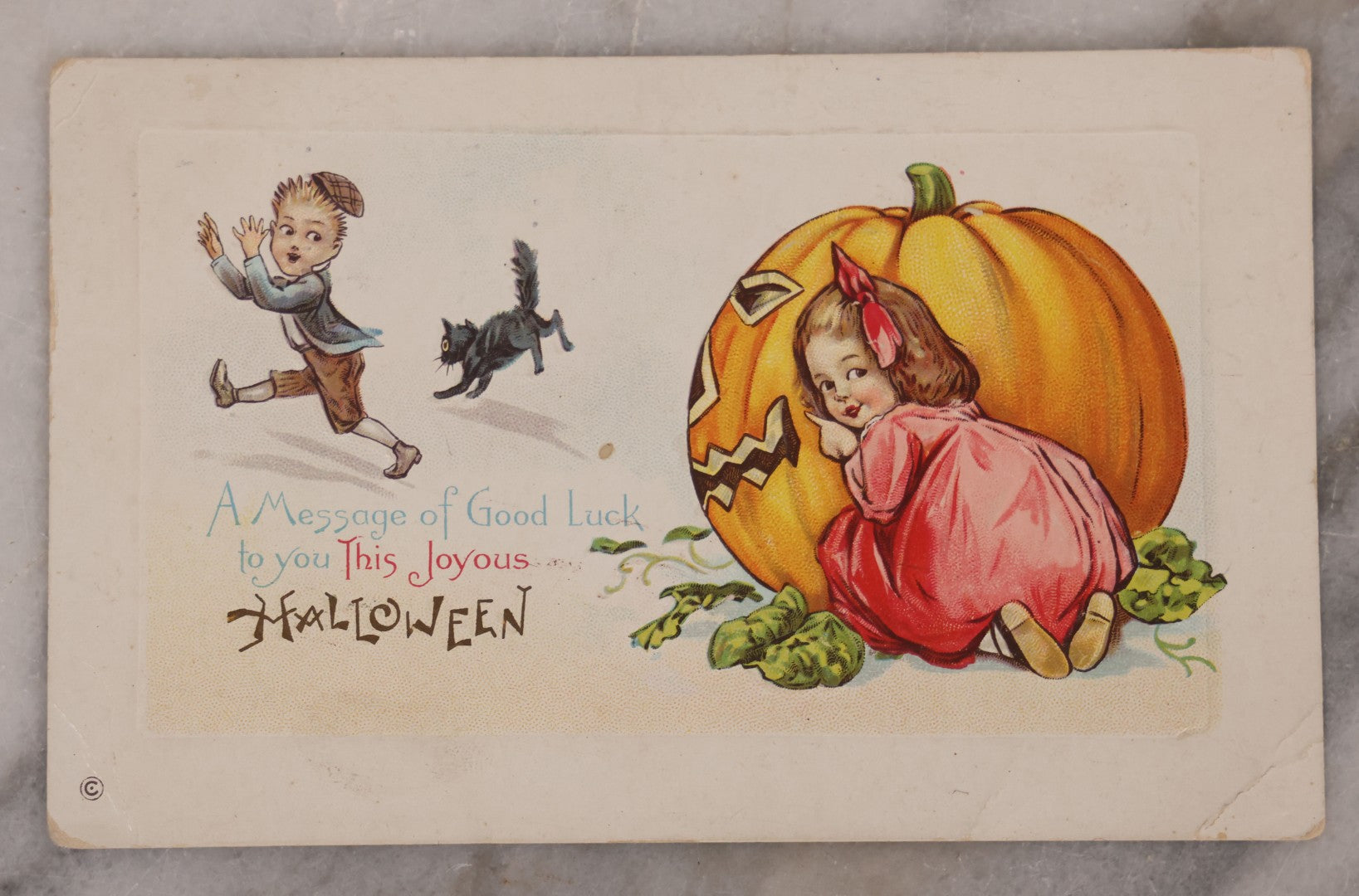 Lot 191 - Pair Of Halloween Ephemera Items Including Antique Halloween Postcard Postmarked 1913 And Vintage Matchbook Cover With Witch Pinup Woman Advertising Lampley's Grill & Service Center, Nashville And Goodlettsville, Tennessee