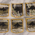 Lot 205 - Grouping Of Six Vintage Vietnam Era Marijuana Doghandler United States Air Force 635th K-9 Section, Thailand Embroidered Patches With Silhouette Of Dog Smoking Joint